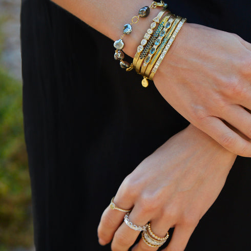in blue-black-yellow diamond ombre<br>and yellow gold<br>shop the look > beeing there <span class='visuallyhidden'>Call, text 323-404-2959 for shopping help.</span>